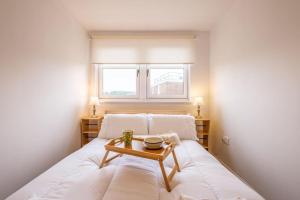 Station Apartment 1 bed- Lanark tesisinde bir odada yatak veya yataklar