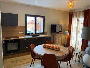 Kuchyňa alebo kuchynka v ubytovaní Charmant appartement