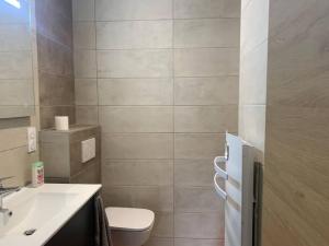 Kúpeľňa v ubytovaní Charmant appartement + 4 fotografie
