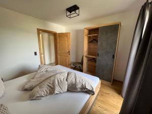 Uma cama ou camas num quarto em Studlerhof