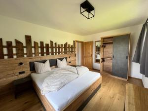 Uma cama ou camas num quarto em Studlerhof