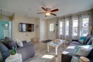 a living room with a couch and a ceiling fan at North Wildwood Vacation Rental 4 Blocks to Beach in North Wildwood