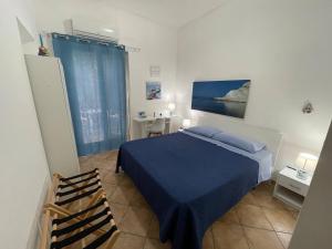 Postel nebo postele na pokoji v ubytování B&B Scala dei Turchi Beach