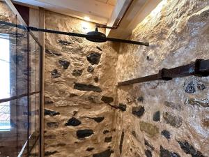 Koupelna v ubytování Romantic home stone with amazing view lake of Como and Oleandra