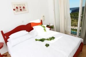 A bed or beds in a room at VILLA STEFANIJA small Boutique hotel&restaurant