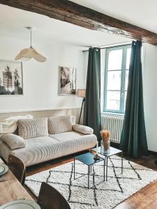 Posezení v ubytování Appartement vue sur château-fort 3 étoiles