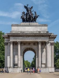 a large monument with a statue on top of it at 2 minutes from Hyde Park, Private Room F in London