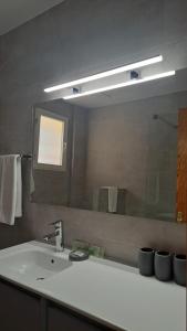 Ванная комната в PuntBlanc Residences