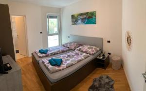 Postel nebo postele na pokoji v ubytování Meli Maisonette Apartments