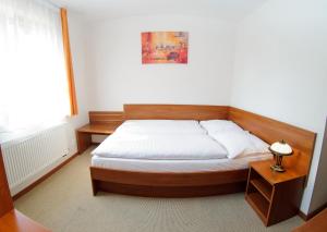 Postel nebo postele na pokoji v ubytování Alexis
