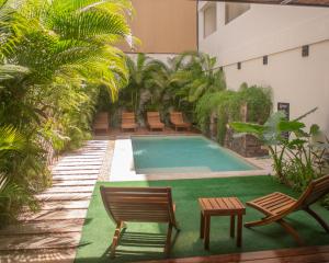 Bazén v ubytovaní Hotel Muyu Tulum alebo v jeho blízkosti