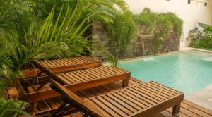 Bazén v ubytování Hotel Muyu Tulum nebo v jeho okolí