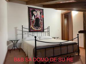 Postel nebo postele na pokoji v ubytování Sa domo de su re