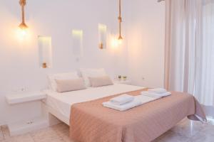 Postel nebo postele na pokoji v ubytování Niki Rooms