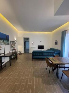 Postel nebo postele na pokoji v ubytování Maison Mercurio Baia Bacoli
