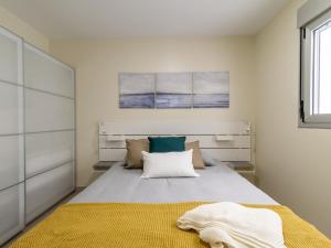Posteľ alebo postele v izbe v ubytovaní Nuevos Lightbooking Livian Suites Las Palmas