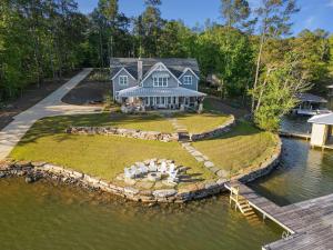 an aerial view of a house on a island in the water at Easy Street 