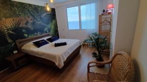 Giường trong phòng chung tại TEUTA- Luxury Penthouse 200m2