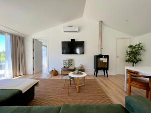 TV a/nebo společenská místnost v ubytování Casas Capela by O'Porto Seven