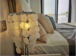 a group of wine glasses sitting next to a bed at Bahia Homes Torrevieja in Torrevieja