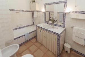Koupelna v ubytování Cottage São Veríssimo + 11 fotografií