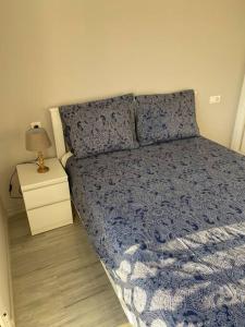 Łóżko lub łóżka w pokoju w obiekcie Lovely Tona