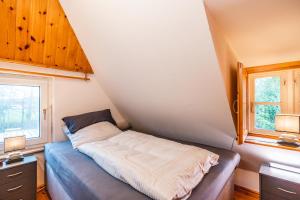 Postel nebo postele na pokoji v ubytování Reethus Deichseele