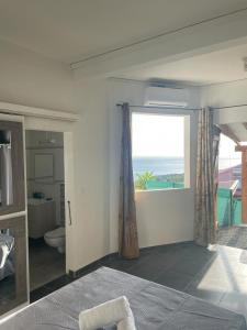 Postel nebo postele na pokoji v ubytování Gîte cosy vue mer