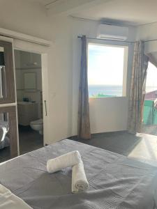 Postel nebo postele na pokoji v ubytování Gîte cosy vue mer