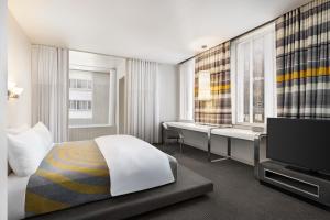 Letto o letti in una camera di The Delphi Downtown LA