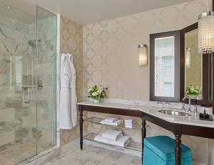 a bathroom with a sink and a shower at The Nines, a Luxury Collection Hotel, Portland in Portland +73 photos