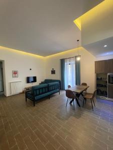 TV a/nebo společenská místnost v ubytování Maison Mercurio Baia Bacoli