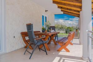 Balkón alebo terasa v ubytovaní Holiday House Paula