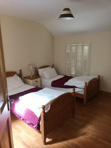 Postel nebo postele na pokoji v ubytování 1 Coirneal Chearta