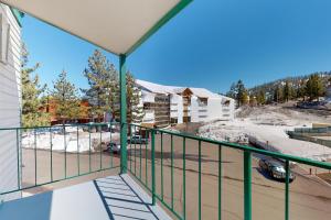 a balcony with a view of a parking lot at Mountain Majesty in Stateline