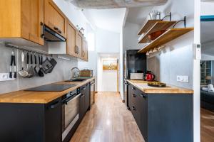 Η κουζίνα ή μικρή κουζίνα στο Le Nid d'Aigle - Le Pont Romain