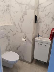 Baðherbergi á location chambre dans plain pied 2 chambres louable