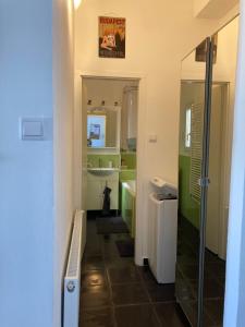 A bathroom at Mester24 Apartman