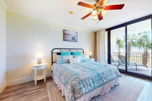 Ένα ή περισσότερα κρεβάτια σε δωμάτιο στο Holiday Isle 118 +33 φωτογραφίες