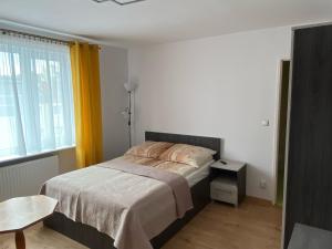Postel nebo postele na pokoji v ubytování DAWIDEK