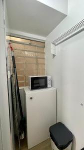 Televízia a/alebo spoločenská miestnosť v ubytovaní Light in Vila-real, piso céntrico con oficina