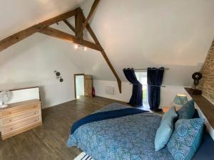 Posteľ alebo postele v izbe v ubytovaní Le Cottage - Gîtes de Cavran
