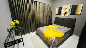 Uma cama ou camas num quarto em Recanto Jade
