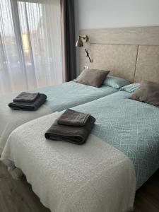 Postel nebo postele na pokoji v ubytování Festastar 402