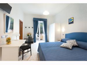 Postel nebo postele na pokoji v ubytování Hotel Britannia + 33 fotografií