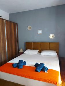Postel nebo postele na pokoji v ubytování Villa Xheni