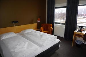 Postel nebo postele na pokoji v ubytování Verdde Hotel Lakselv