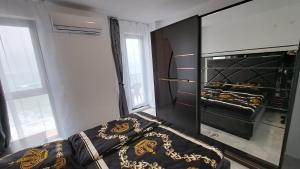 a kitchen with an open oven in a room at Diamond Beach Luxus Apart 22 Obzor in Obzor