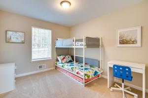 a bedroom with a bunk bed and a desk at Pocono Lake Vacation Rental Community Amenities! in Pocono Lake