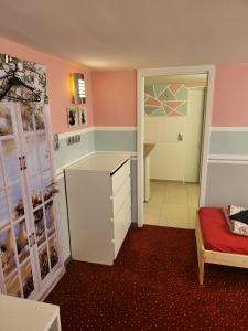 a room with a kitchen and a living room at Hostel Hamburg in Hamburg